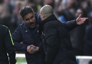 HUDDERSFIELD, ENGLAND - FEBRUARY 18: David Wagner, Manager of Huddersfield Town (L) and Josep Guardiola, Manager of Manchester City (R) embrace after The Emirates FA Cup Fifth Round match between Huddersfield Town and Manchester City at John Smith's Stadium on February 18, 2017 in Huddersfield, England.  (Photo by Gareth Copley/Getty Images)